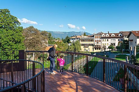 Pushing a stroller on the streets of Sacile