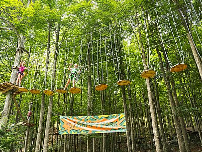 Located in a wonderful beech forest near the tourist resort of Piancavallo, a few hundred meters from the services of the town centre, the Rampy Park offers fun, excitement and the possibility of spending a day outdoors in a safe and stimulating environment. Rampy Park is spread over 50 platforms in 5 different routes differentiated based on difficulty. Everyone from children over 5 years of age and 1 meter tall to adults without age limits can try it. Located in a wonderful beech forest near the tourist resort of Piancavallo, a few hundred meters from the services of the town centre, the Rampy Park offers fun, excitement and the possibility of spending a day outdoors in a safe and stimulating environment. Rampy Park is spread over 50 platforms in 5 different routes differentiated based on difficulty. Everyone from children over 5 years of age and 1 meter tall to adults without age limits can try it.