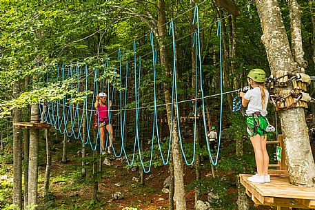 Located in a wonderful beech forest near the tourist resort of Piancavallo, a few hundred meters from the services of the town centre, the Rampy Park offers fun, excitement and the possibility of spending a day outdoors in a safe and stimulating environment. Rampy Park is spread over 50 platforms in 5 different routes differentiated based on difficulty. Everyone from children over 5 years of age and 1 meter tall to adults without age limits can try it.