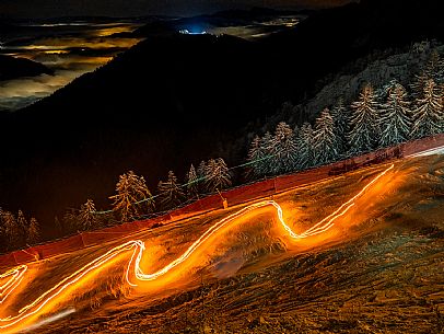 Monte Santo di Lussari.
The Di Prampero slope in Camporosso welcomed 2024 with the 51st of the longest torchlight procession in the entire Alpine arc