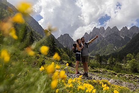 Walking along the fox and bear path in Val Gleris with the majestic Seven Peaks Group in the background, Pontebba