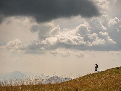 Trekking along the path to the panoramic peak of Monte Crostis, Panoramica delle Vette, Ravascletto, Carnia