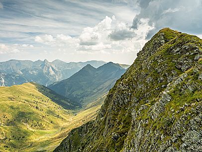 Trekking along the path to the panoramic peak of Monte Crostis, Panoramica delle Vette, Ravascletto, Carnia.