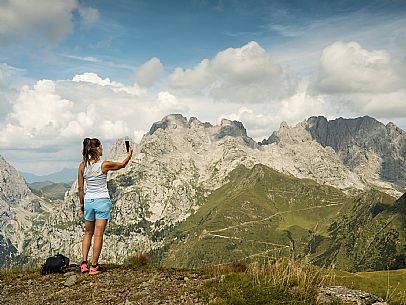 Trekking along the path to the panoramic peak of Monte Crostis, Panoramica delle Vette, Ravascletto, Carnia.