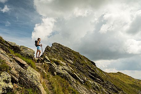 Trekking along the path to the panoramic peak of Monte Crostis, Panoramica delle Vette, Ravascletto, Carnia.