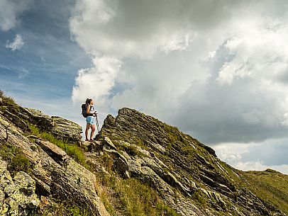 Trekking along the path to the panoramic peak of Monte Crostis, Panoramica delle Vette, Ravascletto, Carnia.
