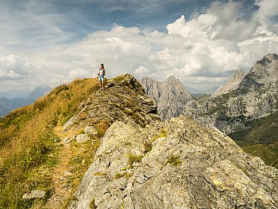 Trekking along the path to the panoramic peak of Monte Crostis, Panoramica delle Vette, Ravascletto, Carnia.