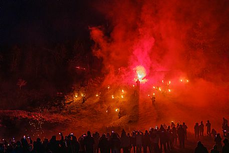 Krampus and St Nicholas, the tradition of 5 December in Tarvisio. Here in the historic village of Camporosso in Valcanale