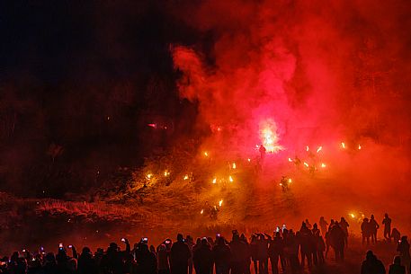 Krampus and St Nicholas, the tradition of 5 December in Tarvisio. Here in the historic village of Camporosso in Valcanale