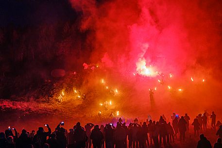 Krampus and St Nicholas, the tradition of 5 December in Tarvisio. Here in the historic village of Camporosso in Valcanale