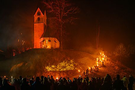 Krampus and St Nicholas, the tradition of 5 December in Tarvisio. Here in the historic village of Camporosso in Valcanale