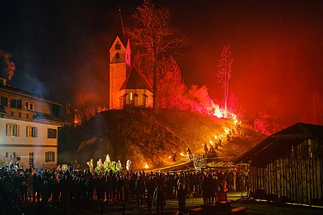 Krampus and St Nicholas, the tradition of 5 December in Tarvisio. Here in the historic village of Camporosso in Valcanale
