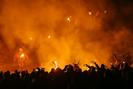 Krampus and St Nicholas, the tradition of 5 December in Tarvisio. Here in the historic village of Camporosso in Valcanale Krampus and St Nicholas, the tradition of 5 December in Tarvisio. Here in the historic village of Camporosso in Valcanale