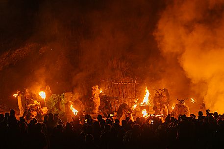 Krampus and St Nicholas, the tradition of 5 December in Tarvisio. Here in the historic village of Camporosso in Valcanale