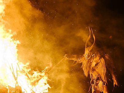 Krampus and St Nicholas, the tradition of 5 December in Tarvisio. Here in the mining village of Cave del Predil