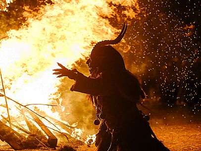 Krampus and St Nicholas, the tradition of 5 December in Tarvisio. Here in the mining village of Cave del Predil Krampus and St Nicholas, the tradition of 5 December in Tarvisio. Here in the mining village of Cave del Predil