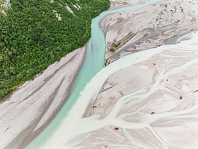 The Tagliamento River near Tolmezzo, Amaro, at the confluence with the Fella River, Carnia, Tolmezzo The Tagliamento River near Tolmezzo, Amaro, at the confluence with the Fella River, Carnia, Tolmezzo