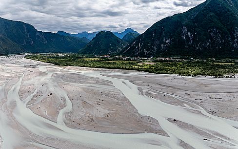 The Tagliamento River near Tolmezzo, Amaro, at the confluence with the Fella River, Carnia, Tolmezzo The Tagliamento River near Tolmezzo, Amaro, at the confluence with the Fella River, Carnia, Tolmezzo