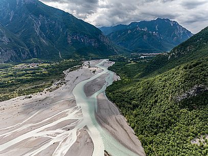 The Tagliamento River near Tolmezzo, Amaro, at the confluence with the Fella River, Carnia, Tolmezzo The Tagliamento River near Tolmezzo, Amaro, at the confluence with the Fella River, Carnia, Tolmezzo