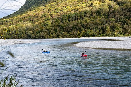Canoeing, kayaking, and packraft activities on the river in the Pinzano al Tagliamento area, near the confluence of the Arzino and Tagliamanto rivers.