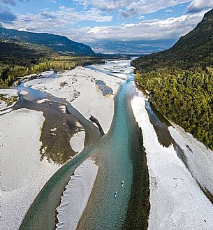 Canoeing, kayaking, and packraft activities on the river in the Pinzano al Tagliamento area, near the confluence of the Arzino and Tagliamanto rivers.