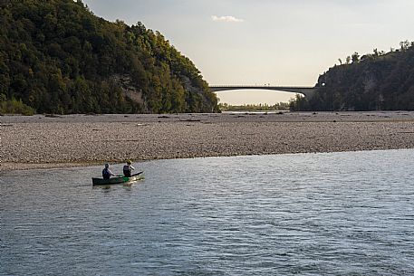 Canoeing, kayaking, and packraft activities on the river in the Pinzano al Tagliamento area, near the confluence of the Arzino and Tagliamanto rivers.