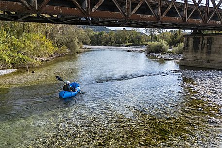 Canoeing, kayaking, and packraft activities on the river in the Pinzano al Tagliamento area, near the confluence of the Arzino and Tagliamanto rivers.
