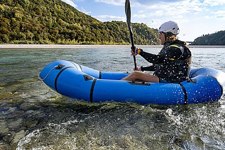 Canoeing, kayaking, and packraft activities on the river in the Pinzano al Tagliamento area, near the confluence of the Arzino and Tagliamanto rivers.