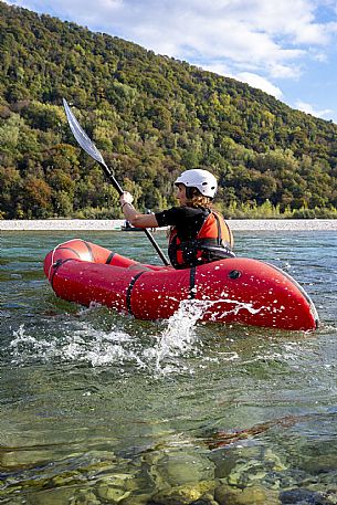 Canoeing, kayaking, and packraft activities on the river in the Pinzano al Tagliamento area, near the confluence of the Arzino and Tagliamanto rivers.