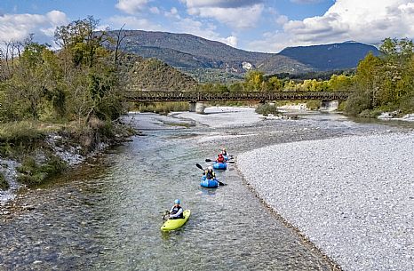 Canoeing, kayaking, and packraft activities on the river in the Pinzano al Tagliamento area, near the confluence of the Arzino and Tagliamanto rivers.