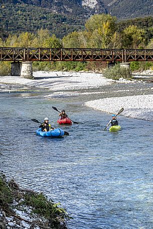 Canoeing, kayaking, and packraft activities on the river in the Pinzano al Tagliamento area, near the confluence of the Arzino and Tagliamanto rivers.