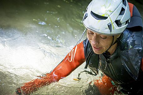 Canyoning in Rio Pielungo, Val d’Arzino Friuli Venezia Giulia, Italy. Participants navigate a spectacular canyon system carved into limestone and dolomite rock, progressing through narrow gorges, natural pools, waterfalls and rope descents under the supervision of the guide. The Rio Pielungo is considered one of the most scenic canyoning routes in the region, combining technical progression, geological interest and a uniquely wild atmosphere shaped by water and time.  [IT] Canyoning nel Rio Pielungo, Val d’Arzino (Friuli Venezia Giulia, Italia). I partecipanti attraversano uno spettacolare sistema di canyon scavato nelle rocce calcaree e dolomitiche, avanzando tra strette gole, pozze naturali, cascate e calate su corda sotto la supervisione di una Guida certificata. Il Rio Pielungo è considerato uno dei percorsi di canyoning più suggestivi della regione, grazie alla combinazione di progressione tecnica, interesse geologico e un’atmosfera autenticamente selvaggia modellata dall’acqua e dal tempo.
