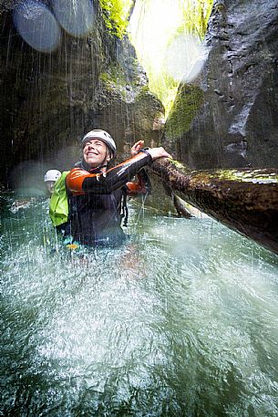Canyoning in Rio Pielungo, Val d’Arzino Friuli Venezia Giulia, Italy. Participants navigate a spectacular canyon system carved into limestone and dolomite rock, progressing through narrow gorges, natural pools, waterfalls and rope descents under the supervision of the guide. The Rio Pielungo is considered one of the most scenic canyoning routes in the region, combining technical progression, geological interest and a uniquely wild atmosphere shaped by water and time.  [IT] Canyoning nel Rio Pielungo, Val d’Arzino (Friuli Venezia Giulia, Italia). I partecipanti attraversano uno spettacolare sistema di canyon scavato nelle rocce calcaree e dolomitiche, avanzando tra strette gole, pozze naturali, cascate e calate su corda sotto la supervisione di una Guida certificata. Il Rio Pielungo è considerato uno dei percorsi di canyoning più suggestivi della regione, grazie alla combinazione di progressione tecnica, interesse geologico e un’atmosfera autenticamente selvaggia modellata dall’acqua e dal tempo.