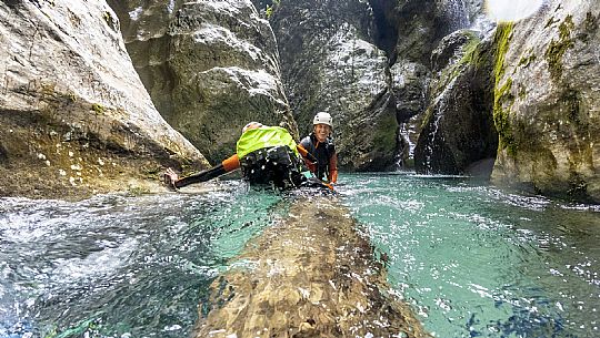 Canyoning in Rio Pielungo, Val d’Arzino Friuli Venezia Giulia, Italy. Participants navigate a spectacular canyon system carved into limestone and dolomite rock, progressing through narrow gorges, natural pools, waterfalls and rope descents under the supervision of the guide. The Rio Pielungo is considered one of the most scenic canyoning routes in the region, combining technical progression, geological interest and a uniquely wild atmosphere shaped by water and time.  [IT] Canyoning nel Rio Pielungo, Val d’Arzino (Friuli Venezia Giulia, Italia). I partecipanti attraversano uno spettacolare sistema di canyon scavato nelle rocce calcaree e dolomitiche, avanzando tra strette gole, pozze naturali, cascate e calate su corda sotto la supervisione di una Guida certificata. Il Rio Pielungo è considerato uno dei percorsi di canyoning più suggestivi della regione, grazie alla combinazione di progressione tecnica, interesse geologico e un’atmosfera autenticamente selvaggia modellata dall’acqua e dal tempo.